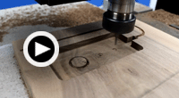 click to play wood cell phone docking station video